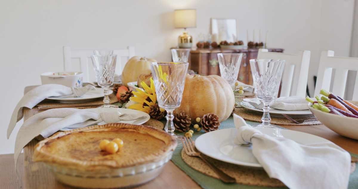 Dinner table with pie and fall decor